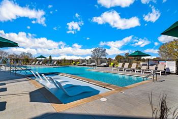 Corban farms at cane ridge resort style pool area with lounge chairs